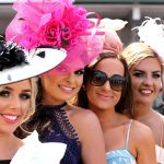 A group of fashionable well dressed women pose whilst enjoying the social atmosphere at Market Rasen Races Ladies Day : Market Rasen Racecourse, Lincolnshire, UK : 21 July 2018 : Pic Mick Atkins